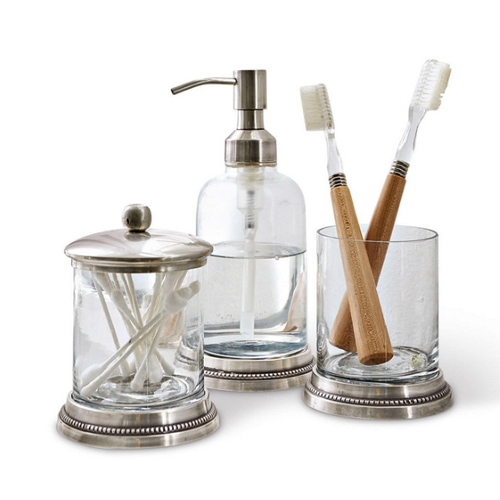 Ensemble de salle de bain en verre avec éléments métalliques, distributeur et pots pour brosses et cotons-tiges