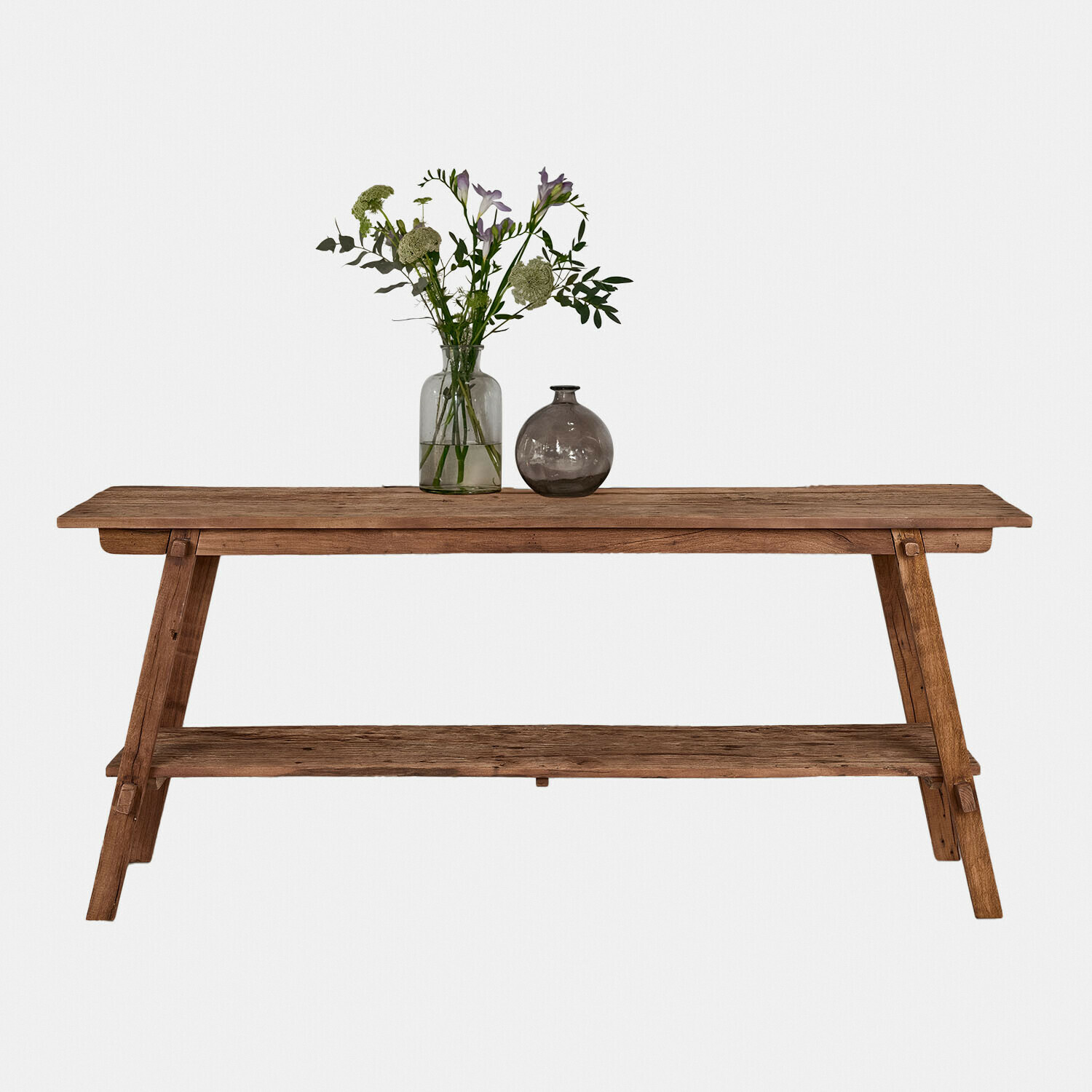 Console Brévonne Table rustique en bois naturel avec étagère inférieure et décoration florale sur le dessus