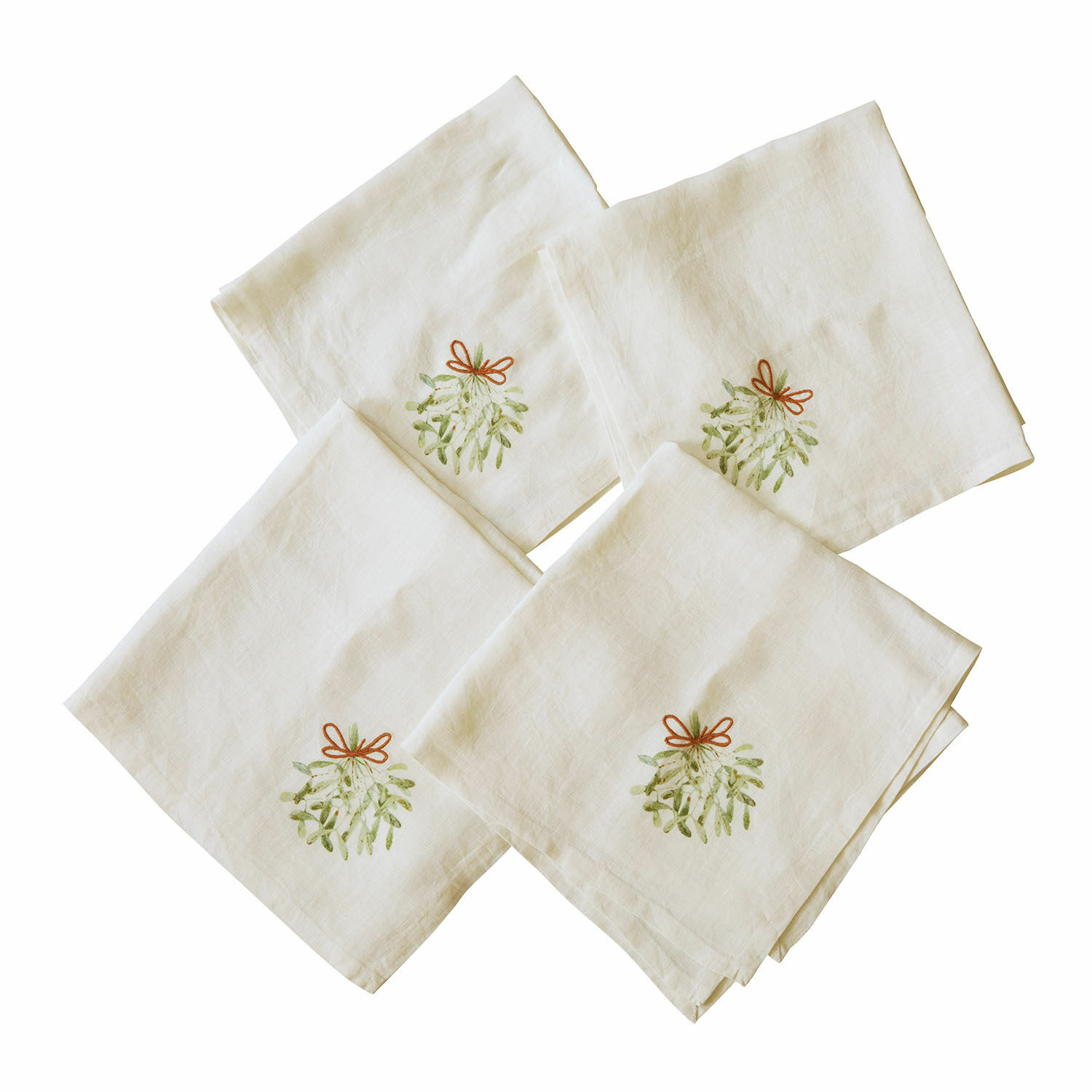 Lot de 4 serviettes de table Mistletoe Lot de quatre serviettes en lin écru avec broderie de gui et nœud rouge pour décoration de table