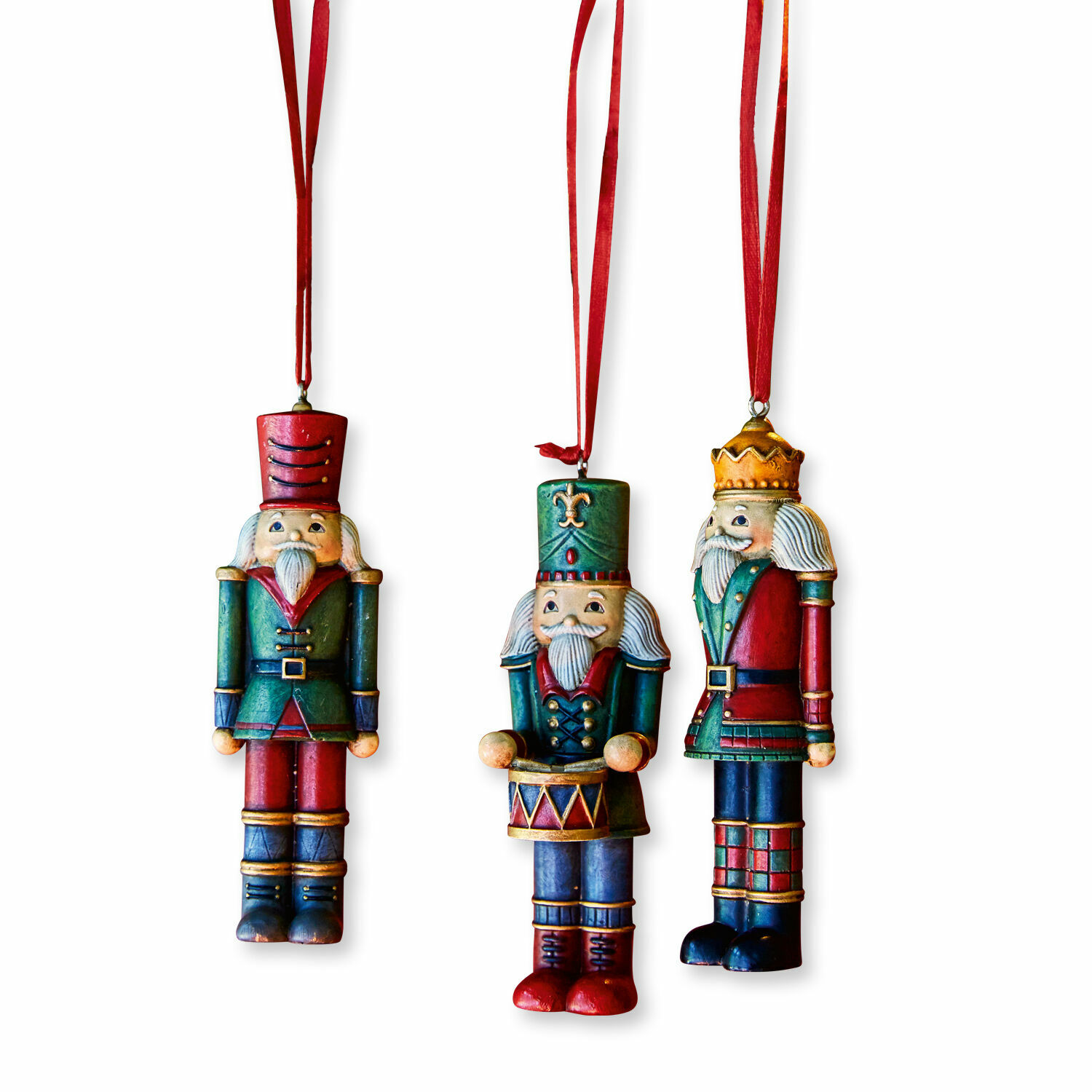 Lot de 3 décorations à suspendre Laudat Ensemble de trois décorations en bois pour sapin en forme de soldats aux couleurs rouge et vert