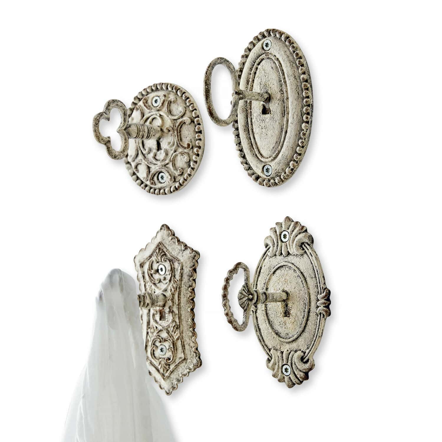 Lot de 4 patères Codrington Ensemble de quatre crochets muraux décoratifs en métal blanc vieilli pour suspendre des textiles