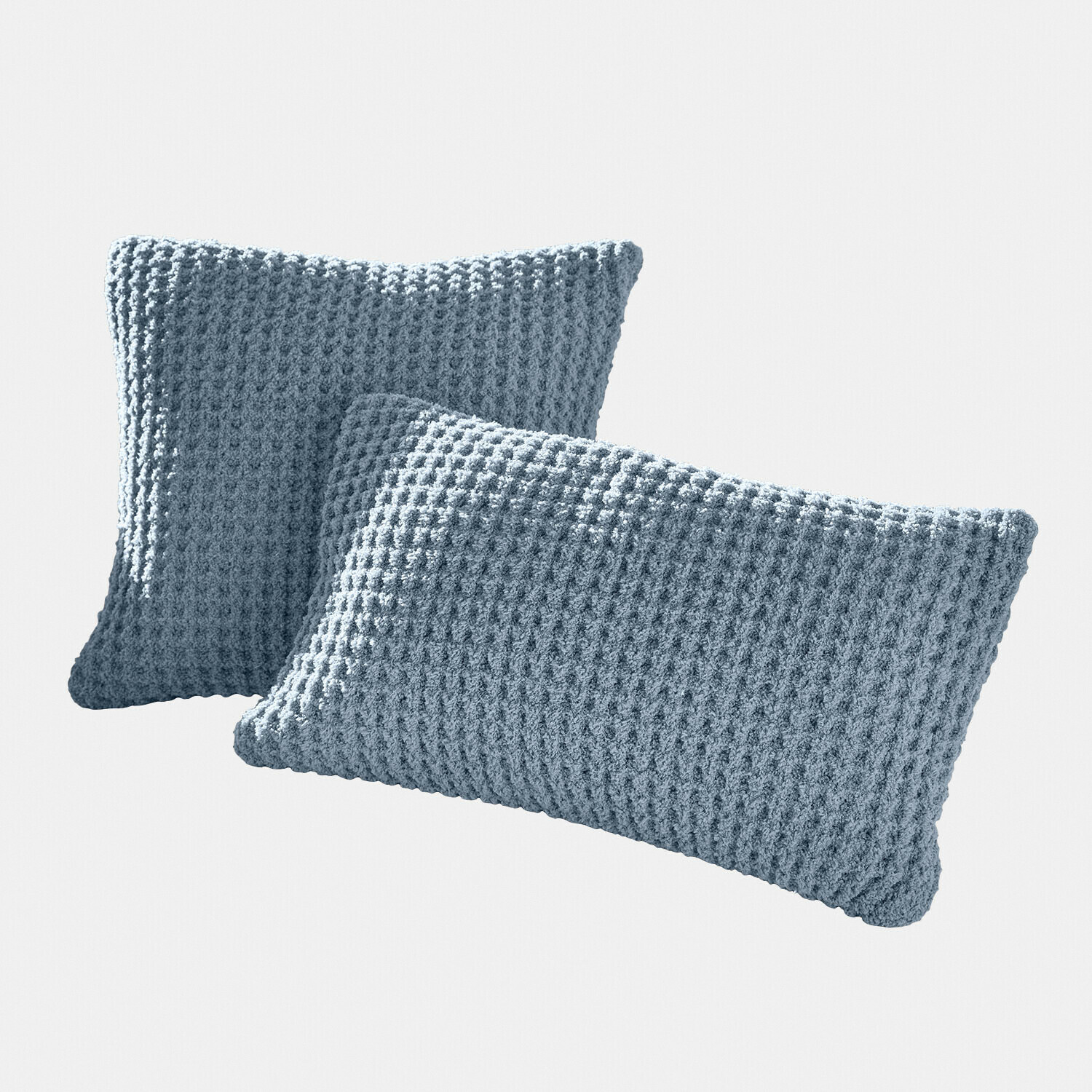 Lot de 2 housses de coussins Ysilda Deux coussins bleus en tissu tricoté doux avec texture gaufrée pour décoration intérieure