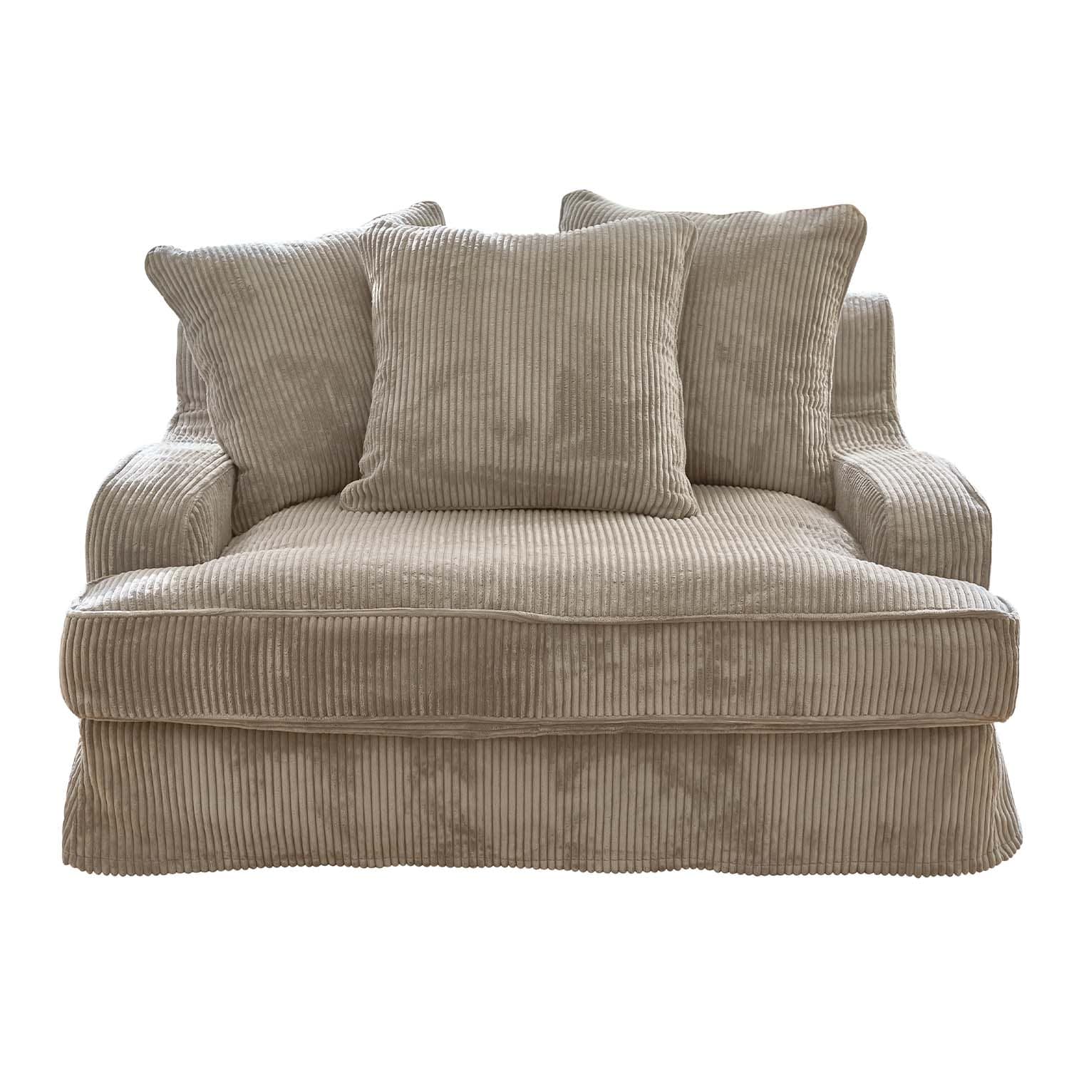 Canapé beige en velours côtelé doux avec trois coussins, confortable pour salon