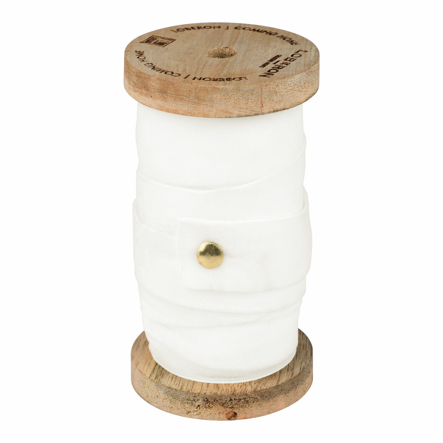 Ruban en velours crème enroulé sur une bobine en bois pour décoration et artisanat