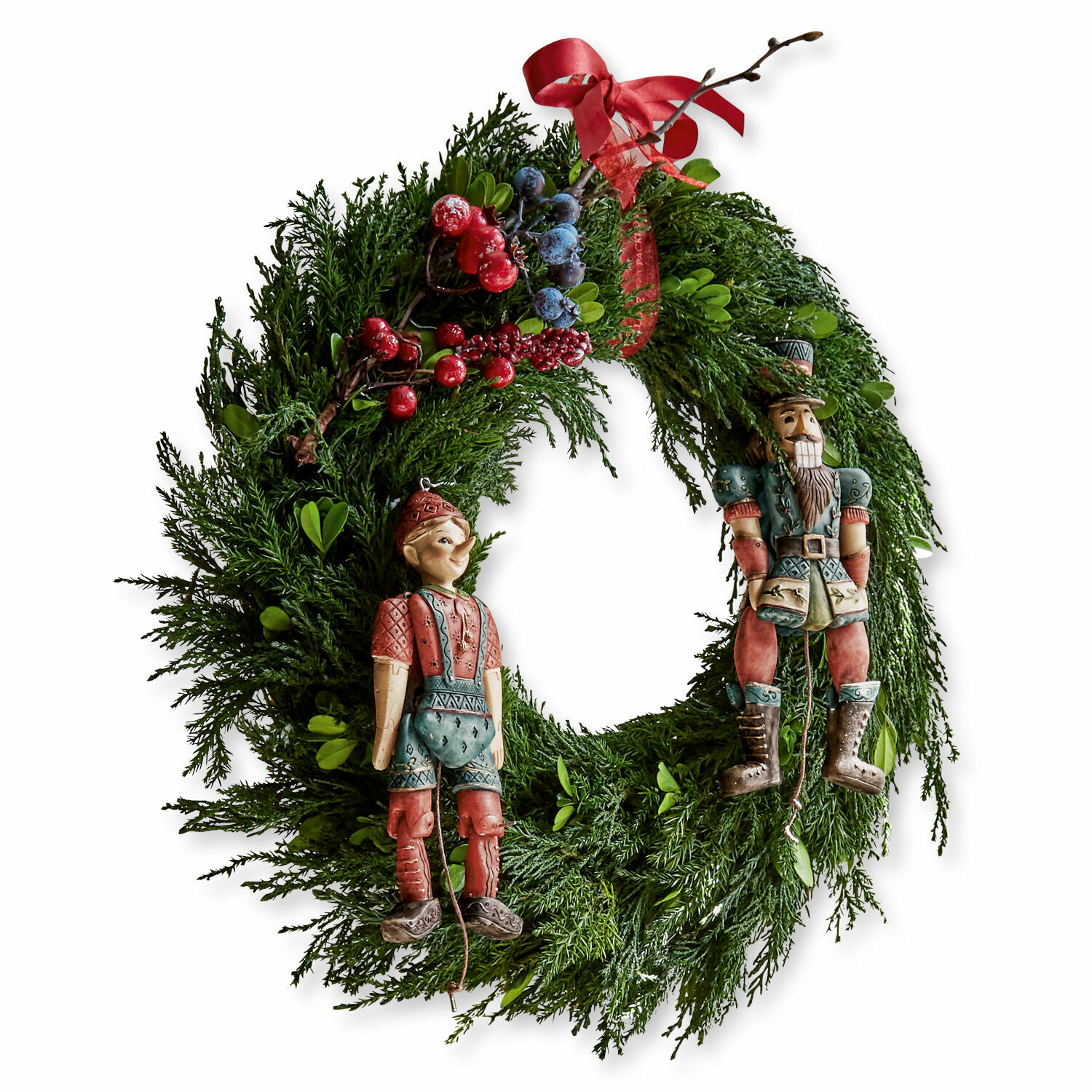 Couronne Dahab Couronne de Noël en branches vertes avec baies rouges et bleues, décorée de figurines en bois de casse-noisette et garçon