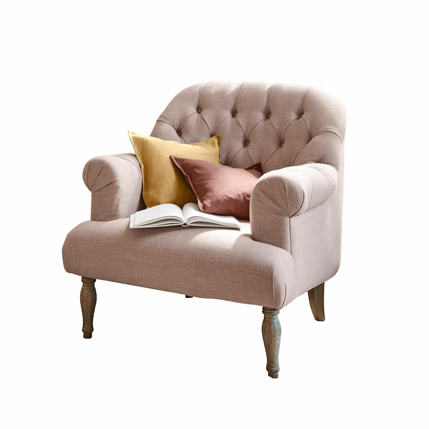 Fauteuil Shambrook Canapé rembourré rose avec pieds en bois, décoré de deux coussins et d'un livre ouvert