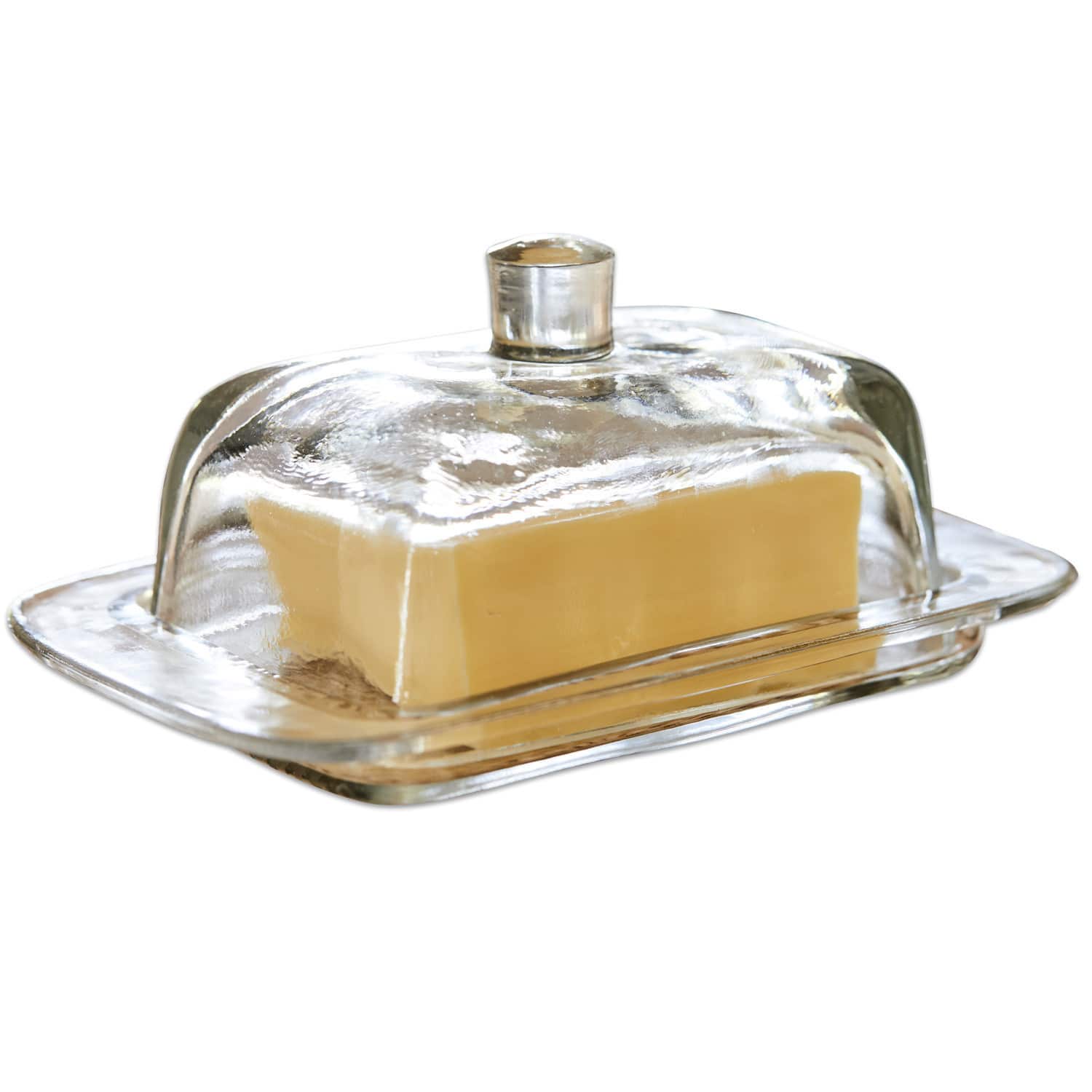 Beurrier Annie Beurrier en verre transparent avec couvercle et morceau de beurre jaune sur fond blanc