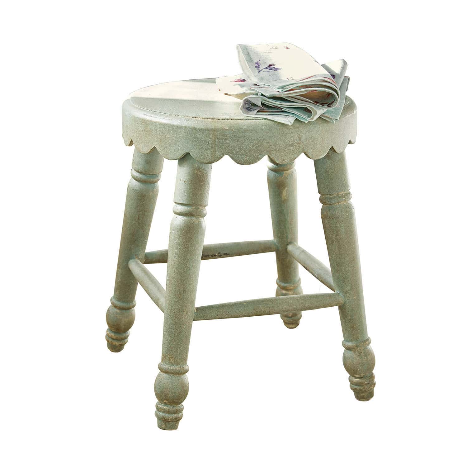 Tabouret Nirvent Tabouret rond en bois vert avec bord festonné et tissu plié sur l'assise