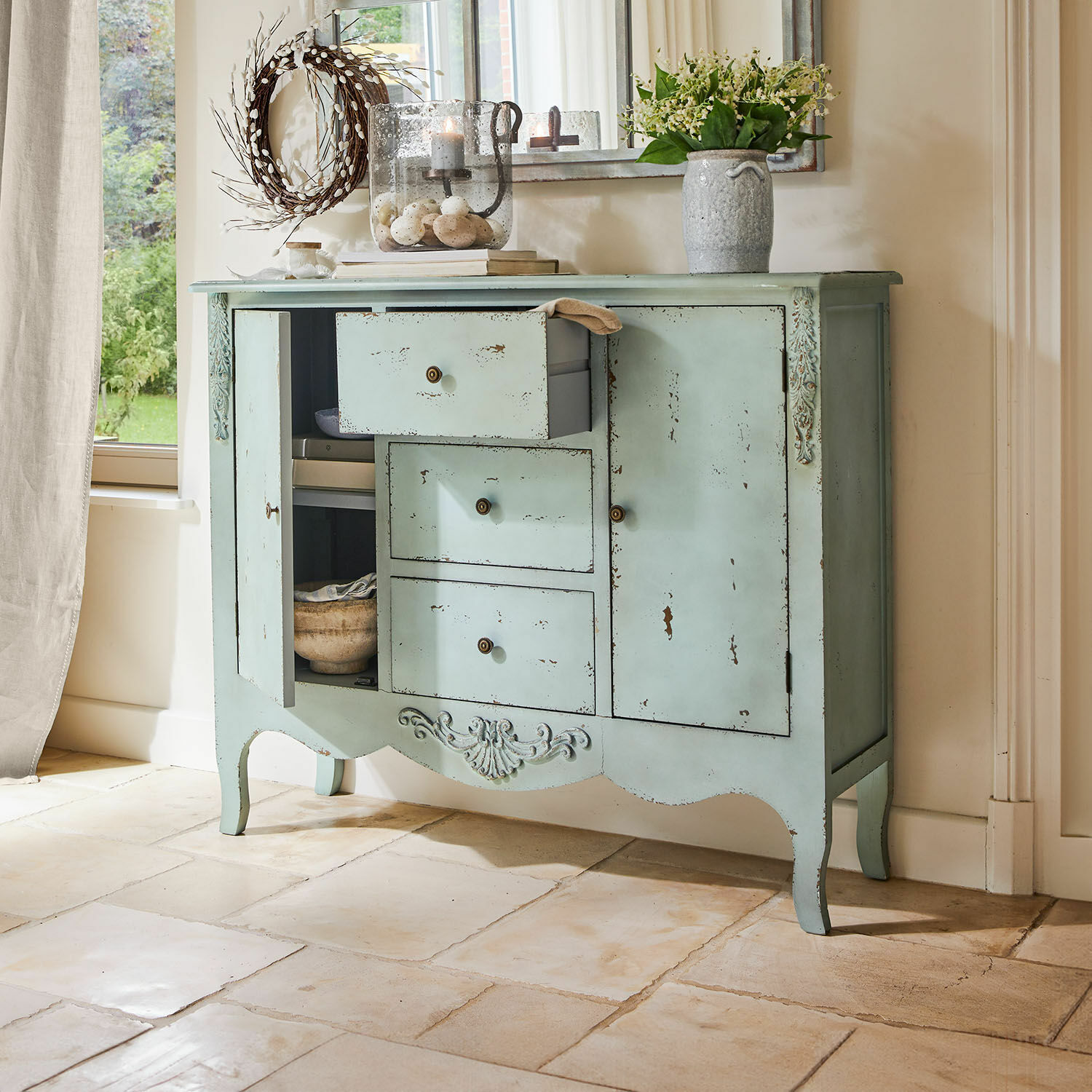 Buffet Thalorian Buffet en bois vert menthe avec trois tiroirs et deux portes style vintage pour salon