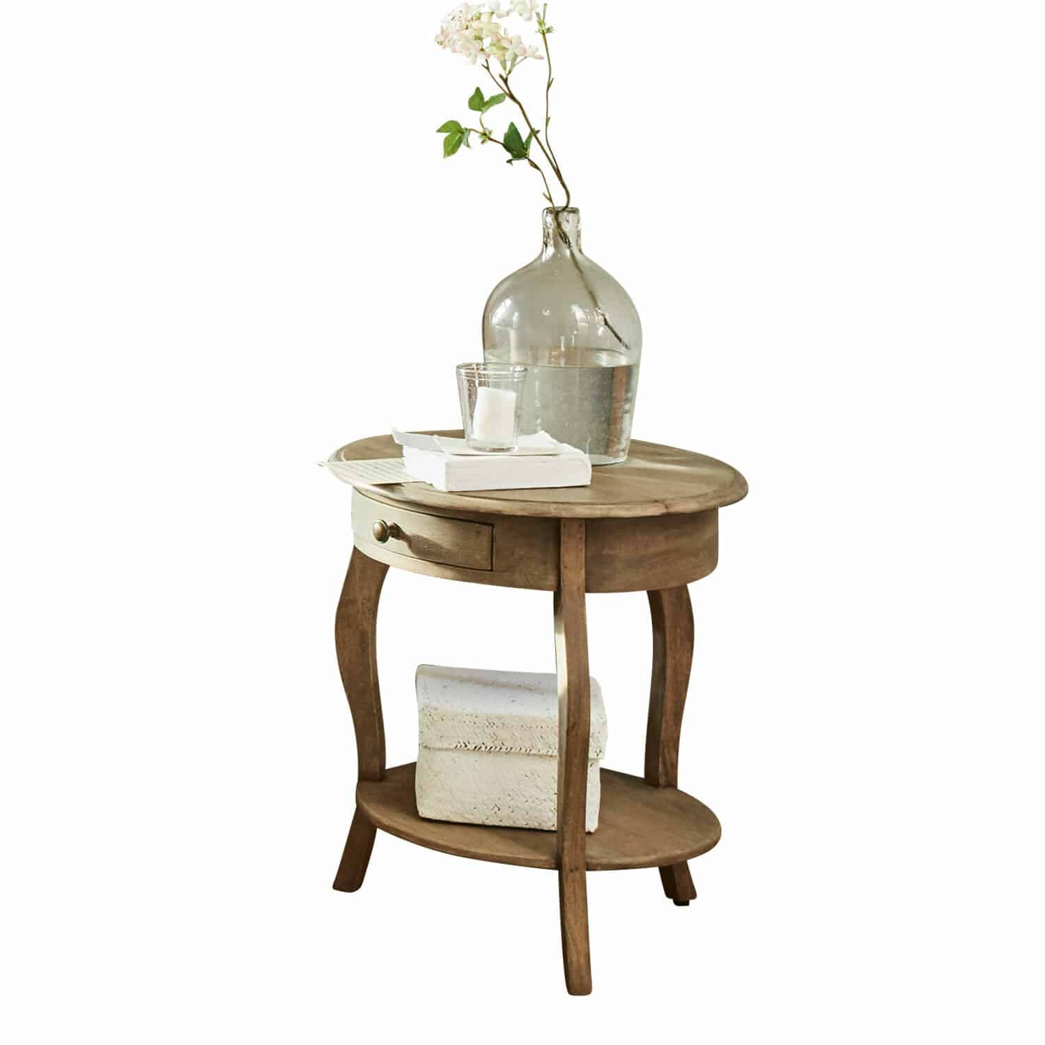Table d'appoint Jace Table ronde en bois avec tiroir et étagère, décorée d'un vase transparent et de livres blancs