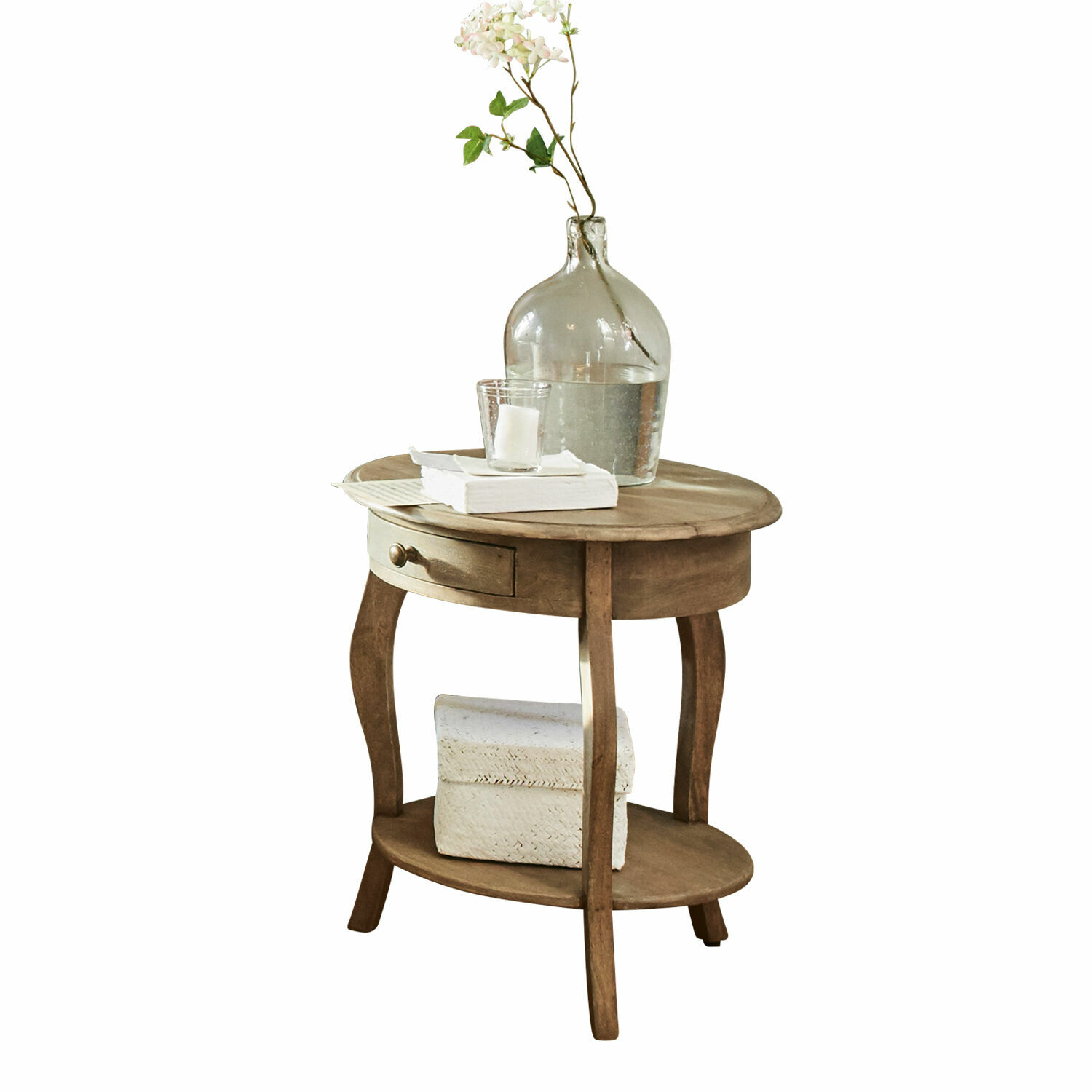 Table d'appoint Jace Table ronde en bois avec tiroir et étagère, décorée d'un vase transparent et de livres blancs