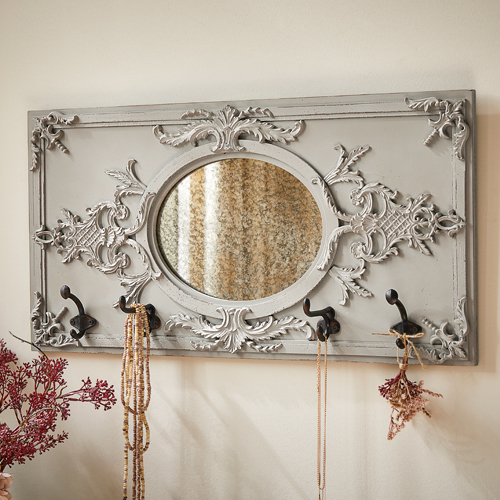Patère murale décorative grise avec miroir ovale et trois crochets en métal pour bijoux