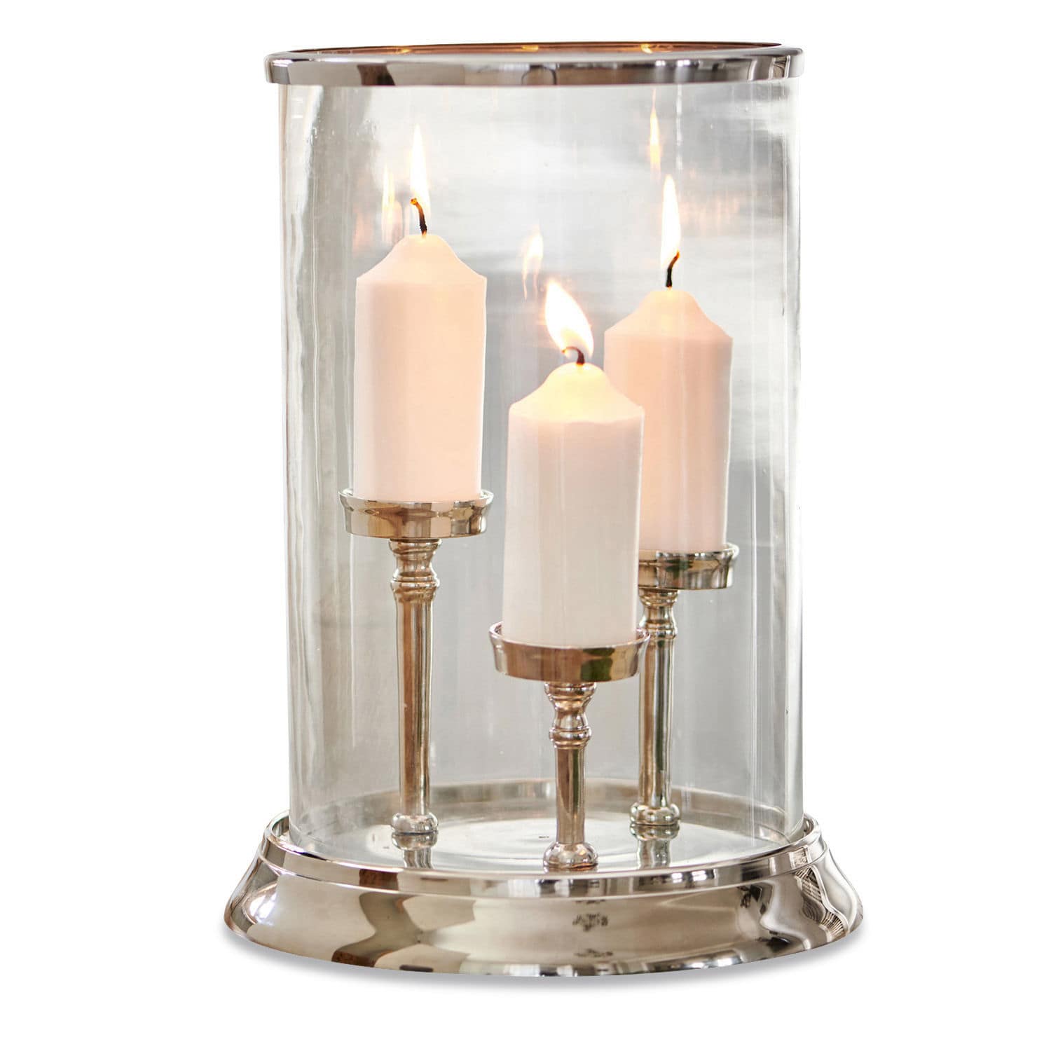 Photophore Vinzan Bougeoir en verre avec base métallique et trois bougies blanches allumées, décoration intérieure