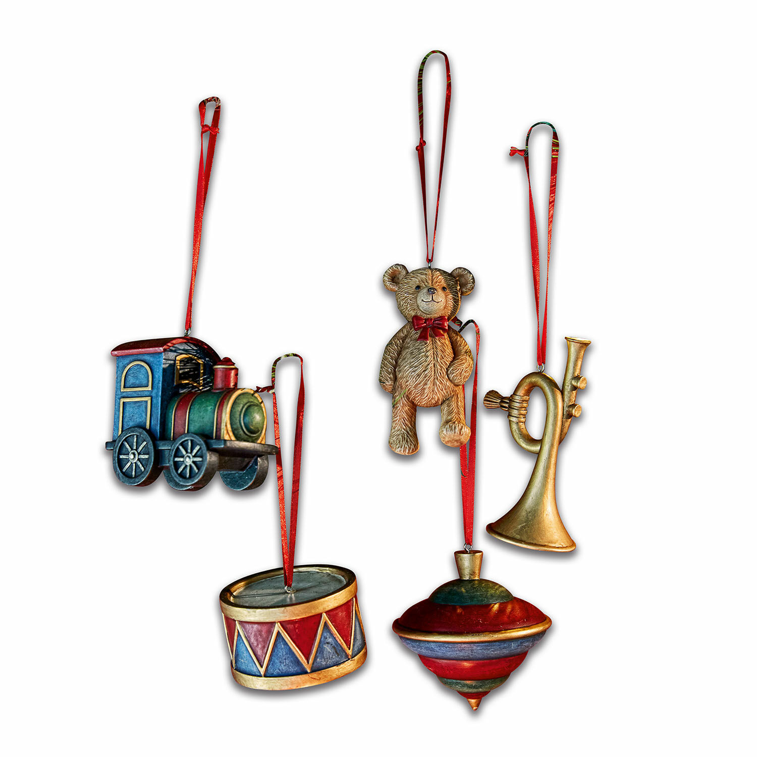 Ensemble de cinq décorations de Noël en métal : locomotive, tambour, ours, toupie et trompette avec rubans rouges