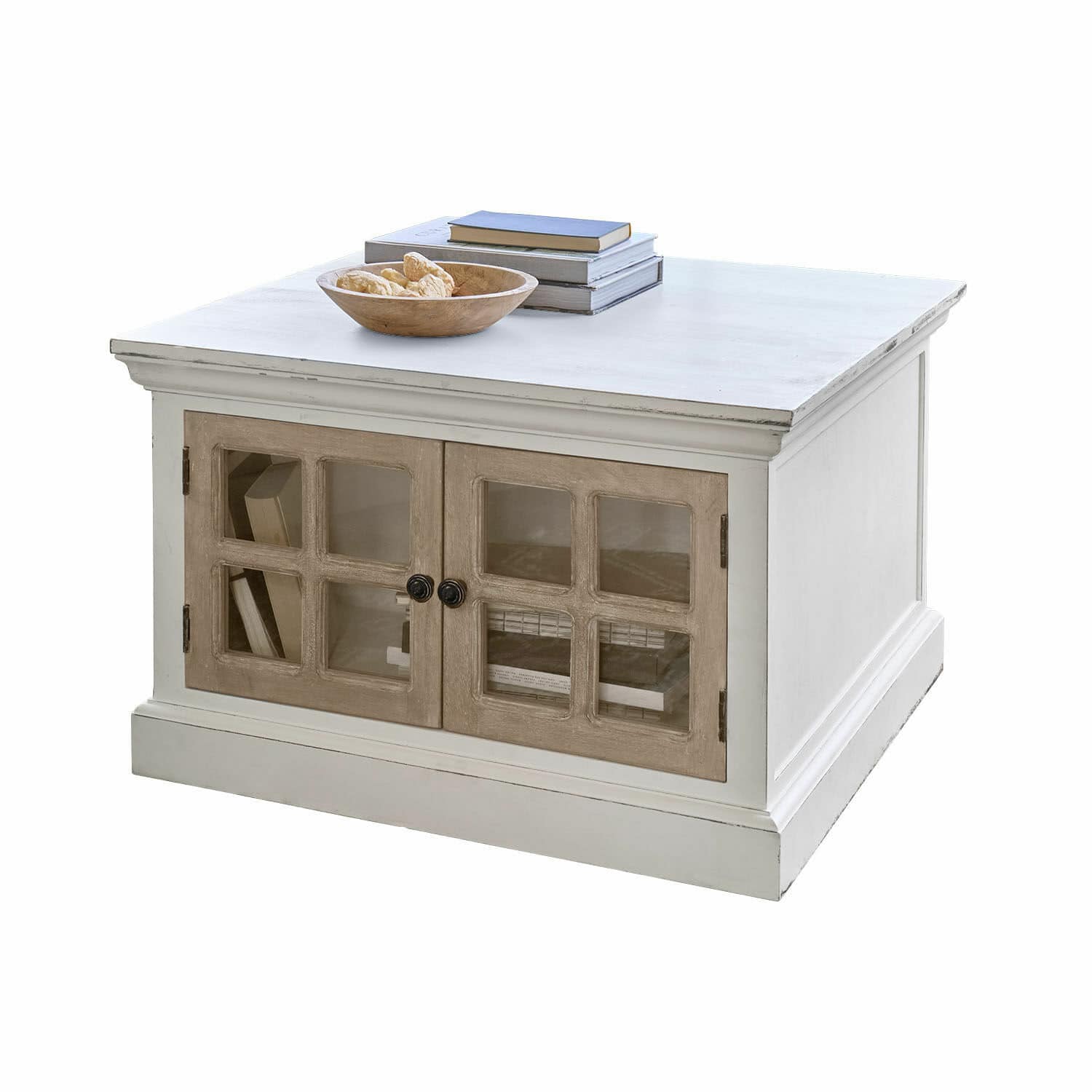 Table basse Marshwood Table basse carrée en bois blanc avec portes vitrées et bol décoratif sur des livres