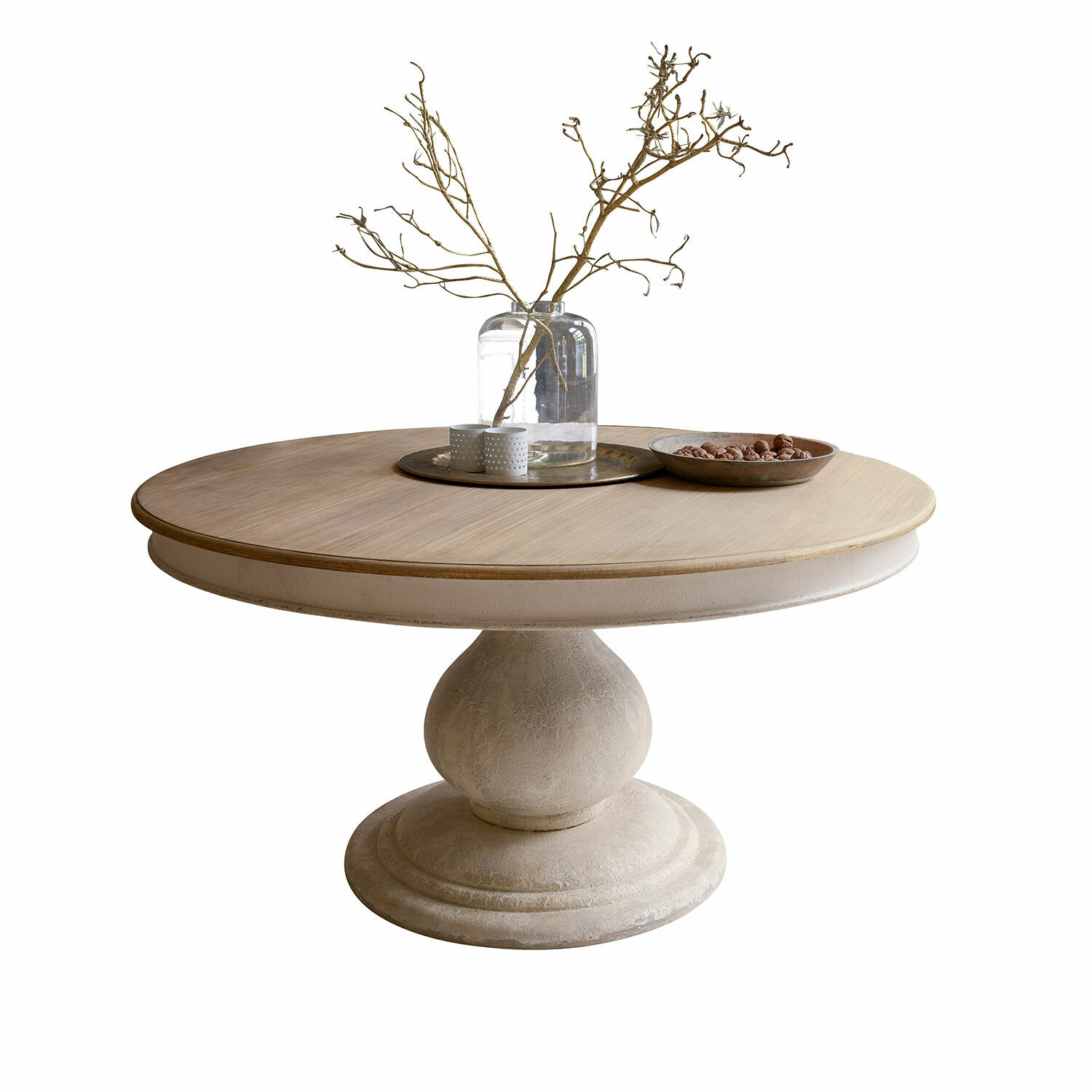 Table Calvigny Table ronde en bois clair avec pied en pierre et décoration sur le plateau pour salon