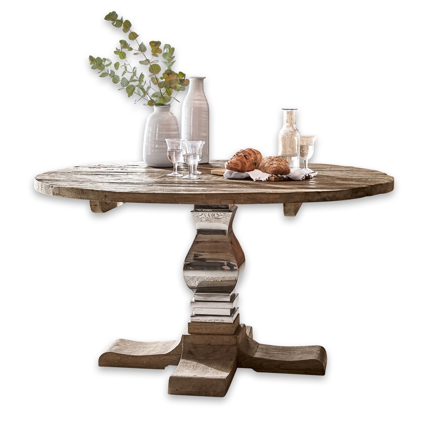 Table Vermilion Table ronde en bois avec pied en métal, décorée de vases et de pains sur le dessus