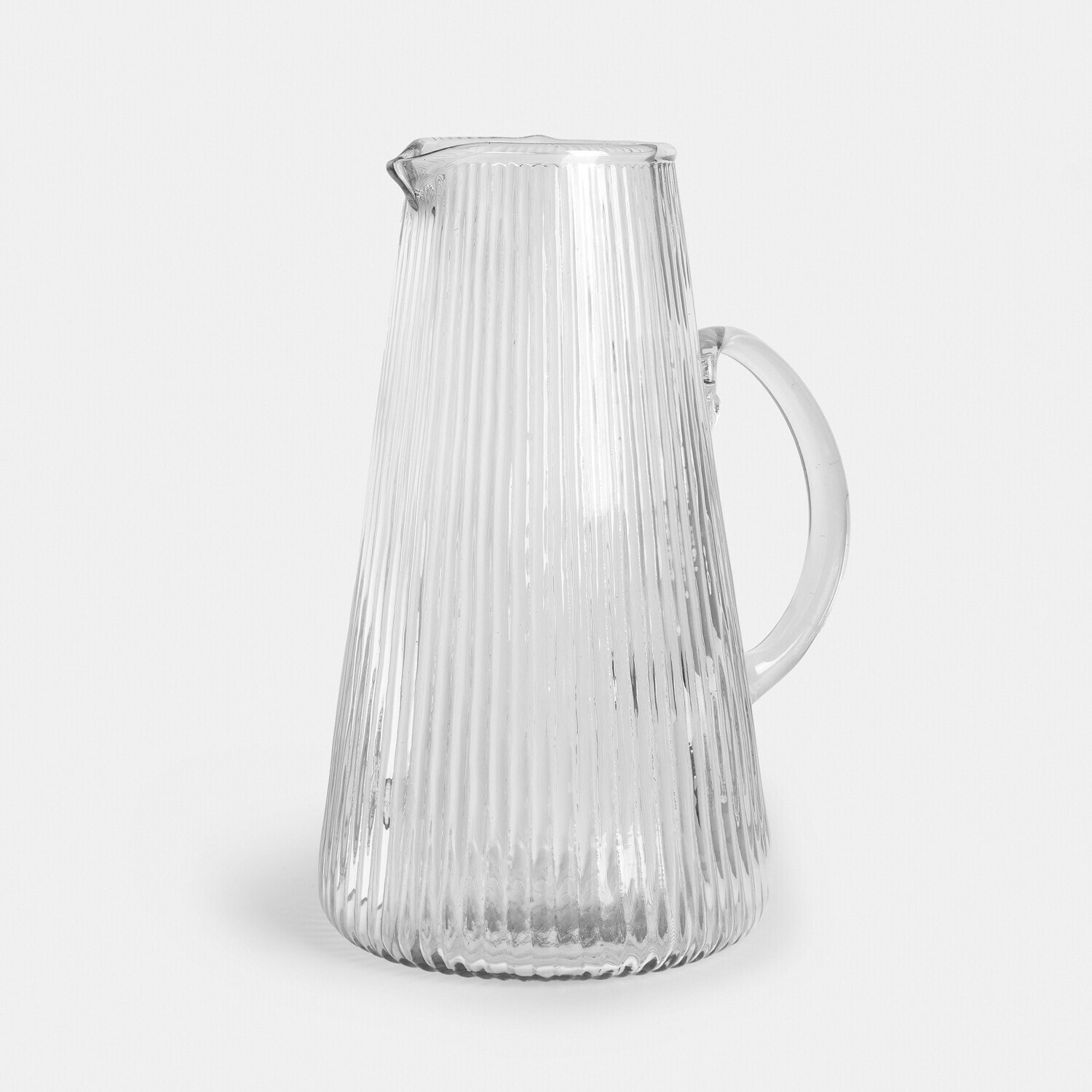 Pichet Caleza Carafe en verre transparent avec surface cannelée et anse pour servir des boissons