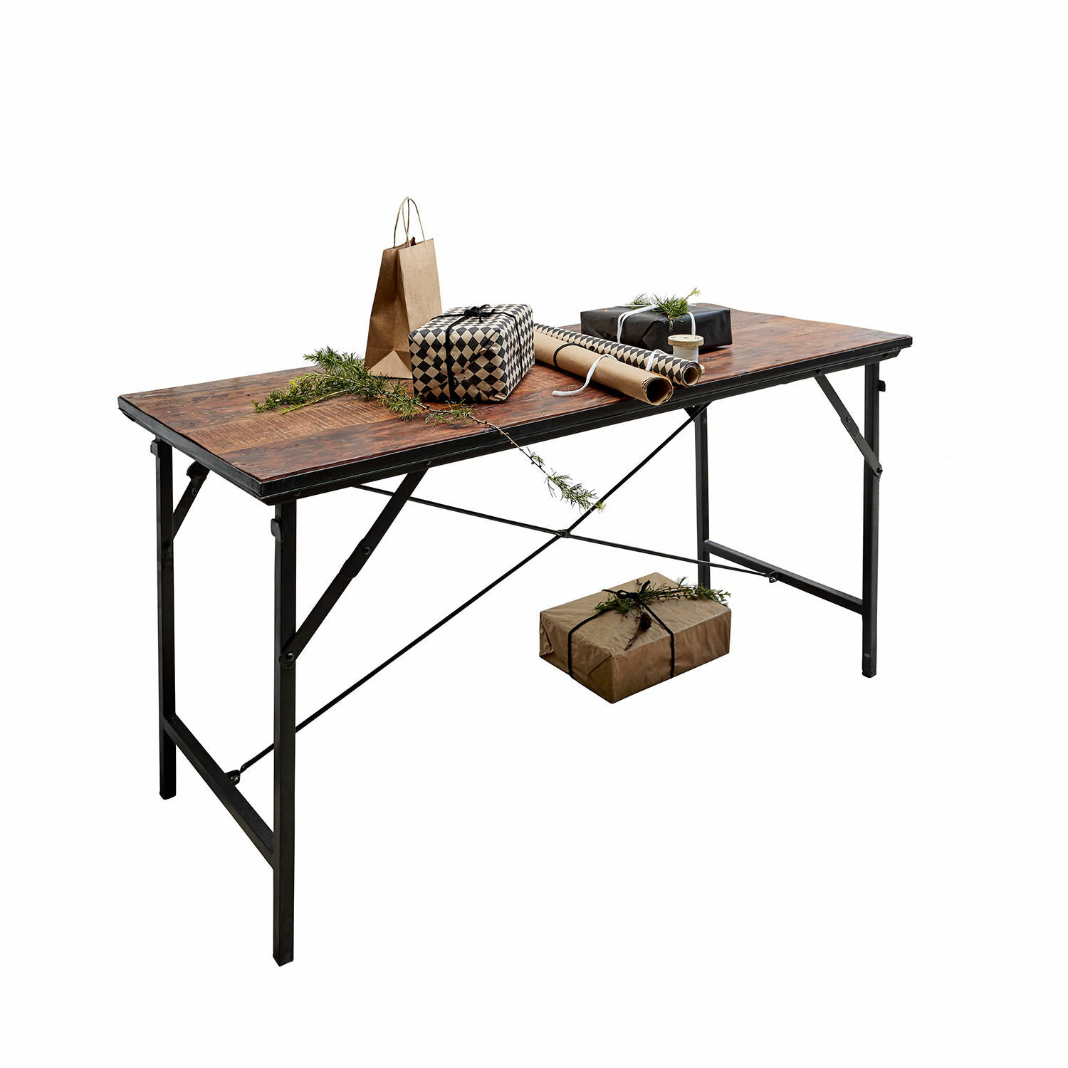 Table Baussant Table pliante en bois foncé avec cadre métallique, décorée de cadeaux et de branches vertes