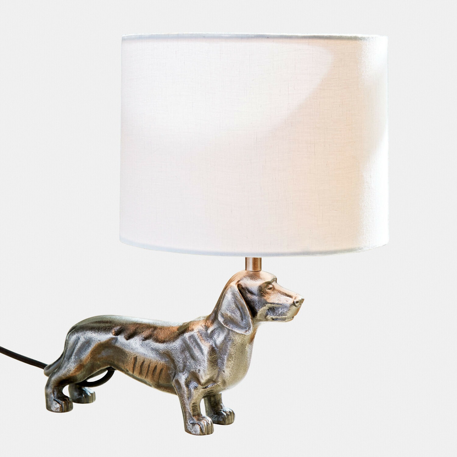 Lampe de table avec abat-jour blanc et base en forme de chien teckel argenté
