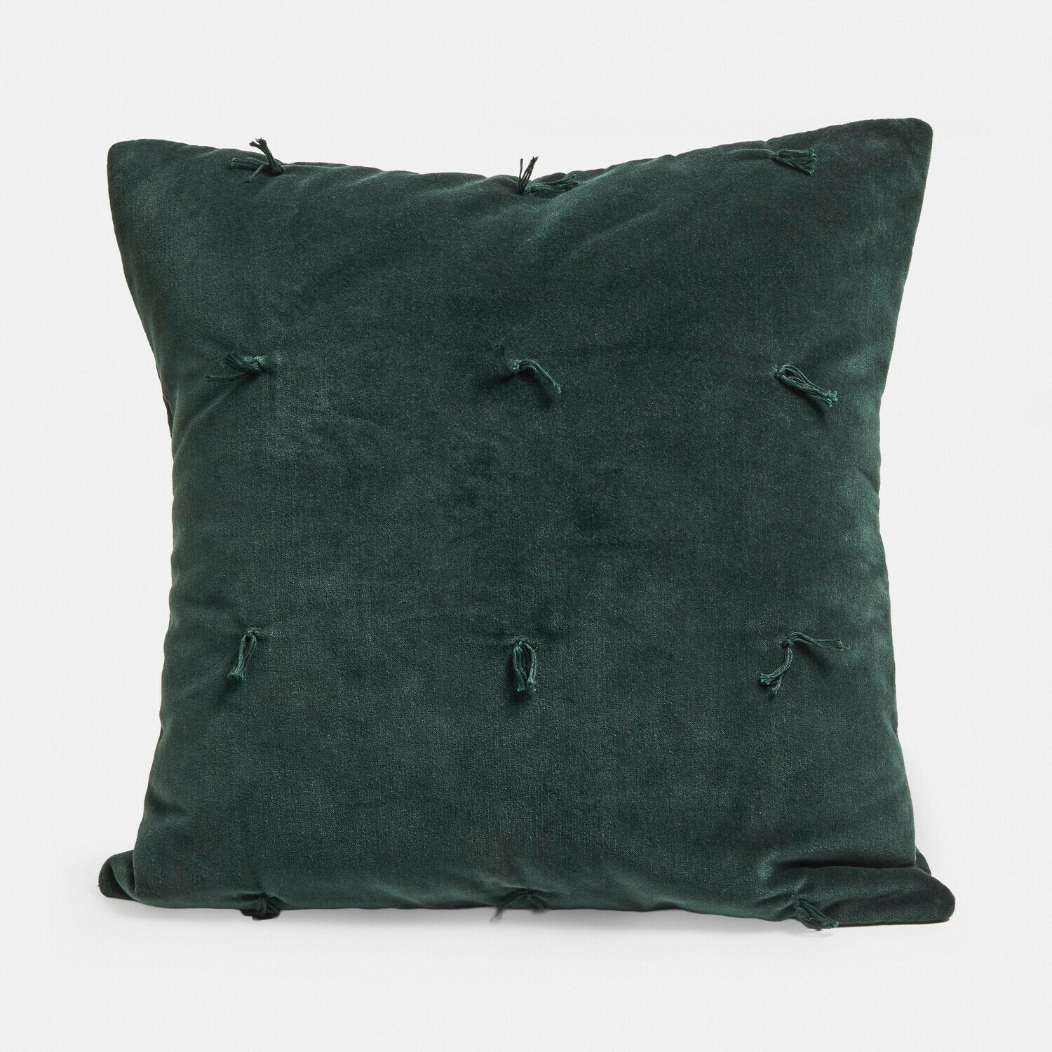 Coussin décoratif en velours vert foncé avec nœuds décoratifs, doux et élégant pour le salon