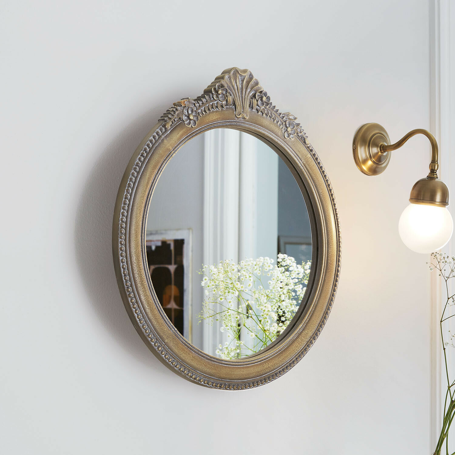 Miroir Avelisse Miroir ovale avec cadre orné couleur or ancien, décoration murale élégante pour intérieur vintage