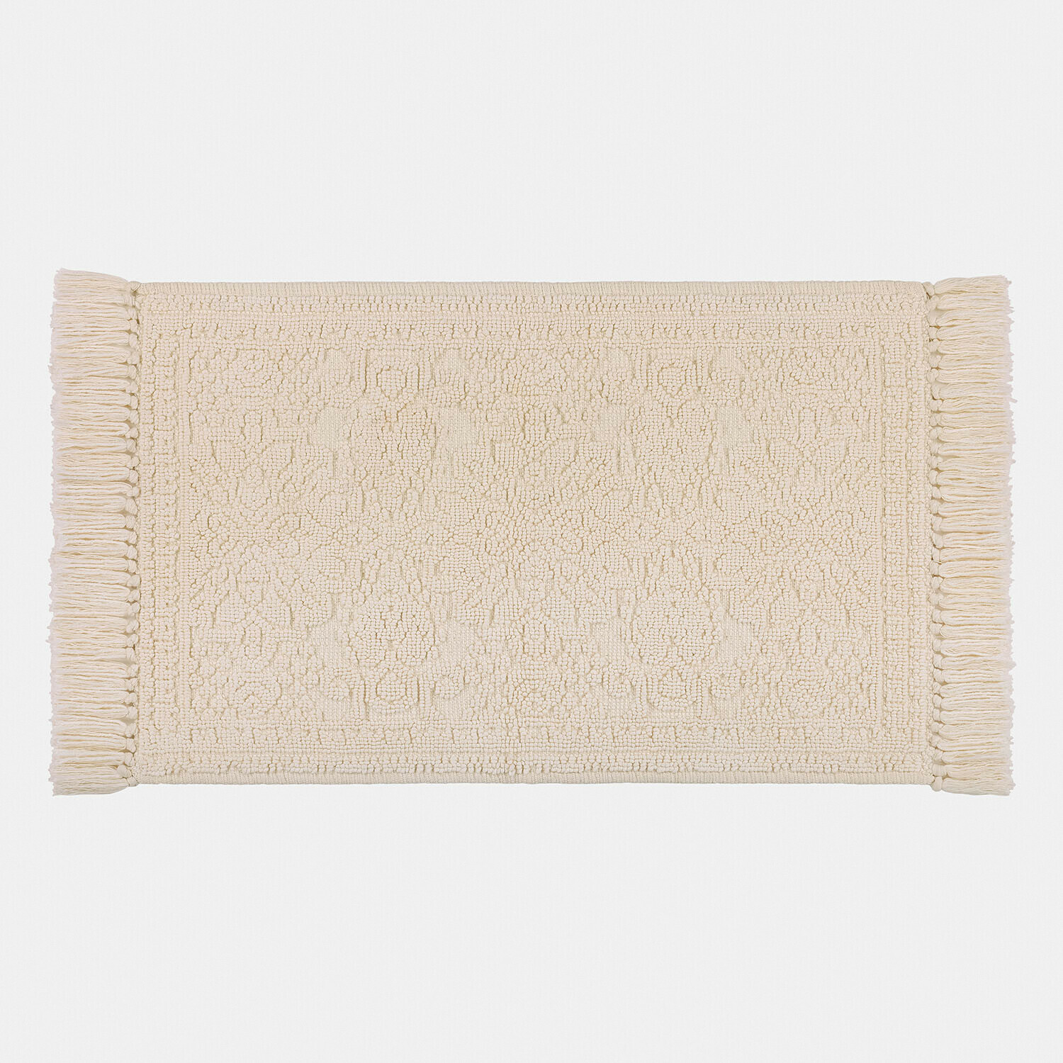 Tapis en coton beige avec franges et motif subtil, doux et décoratif pour intérieur