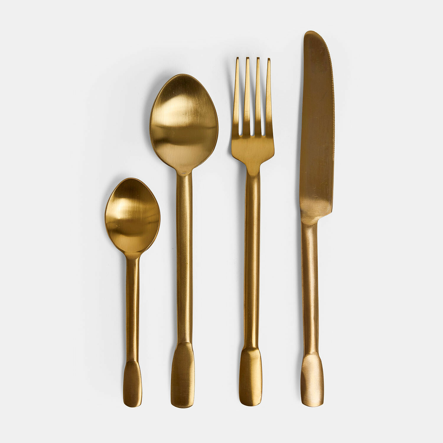 Couverts Malroy en acier inoxydable doré, design élégant pour une table raffinée