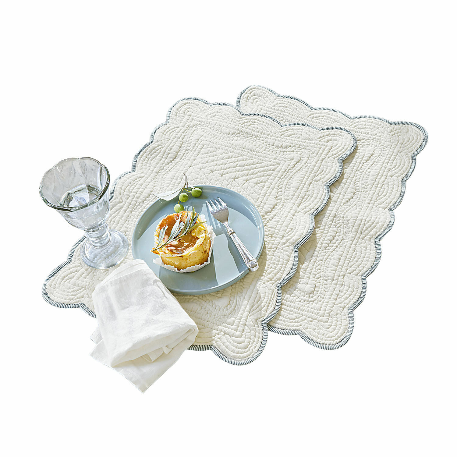 Lot de 2 sets de table Fontienne Ensemble de deux sets de table en coton crème avec quilting décoratif et bordure grise