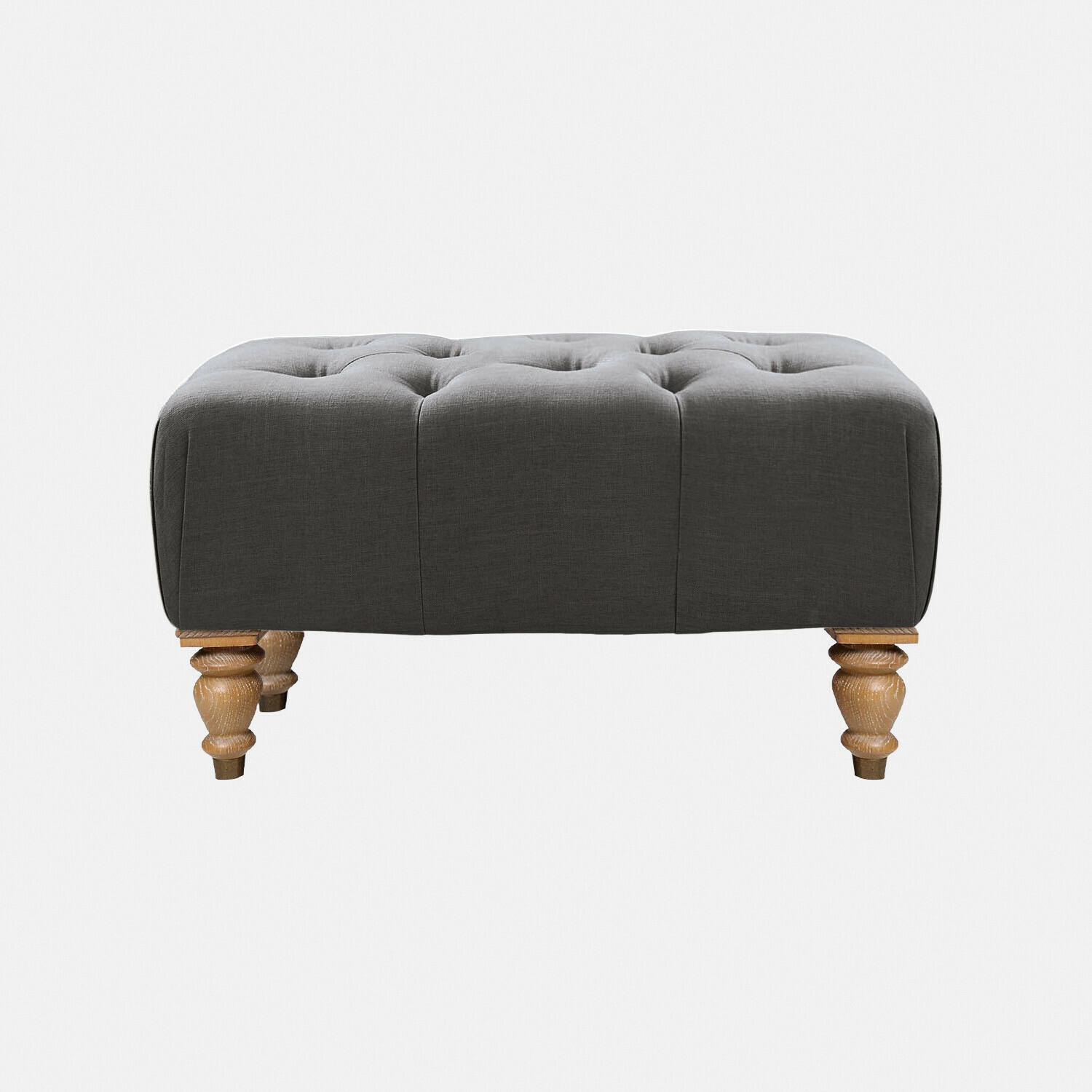 Tabouret Durance Pouf gris capitonné en tissu avec pieds en bois sculpté pour salon élégant