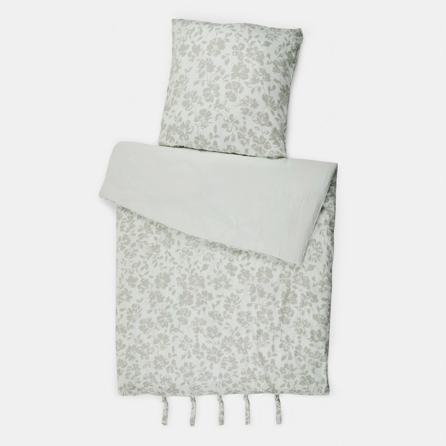 Parure de lit Walerina Parure de lit en coton clair avec motif floral discret et liens d'attache pour maintien