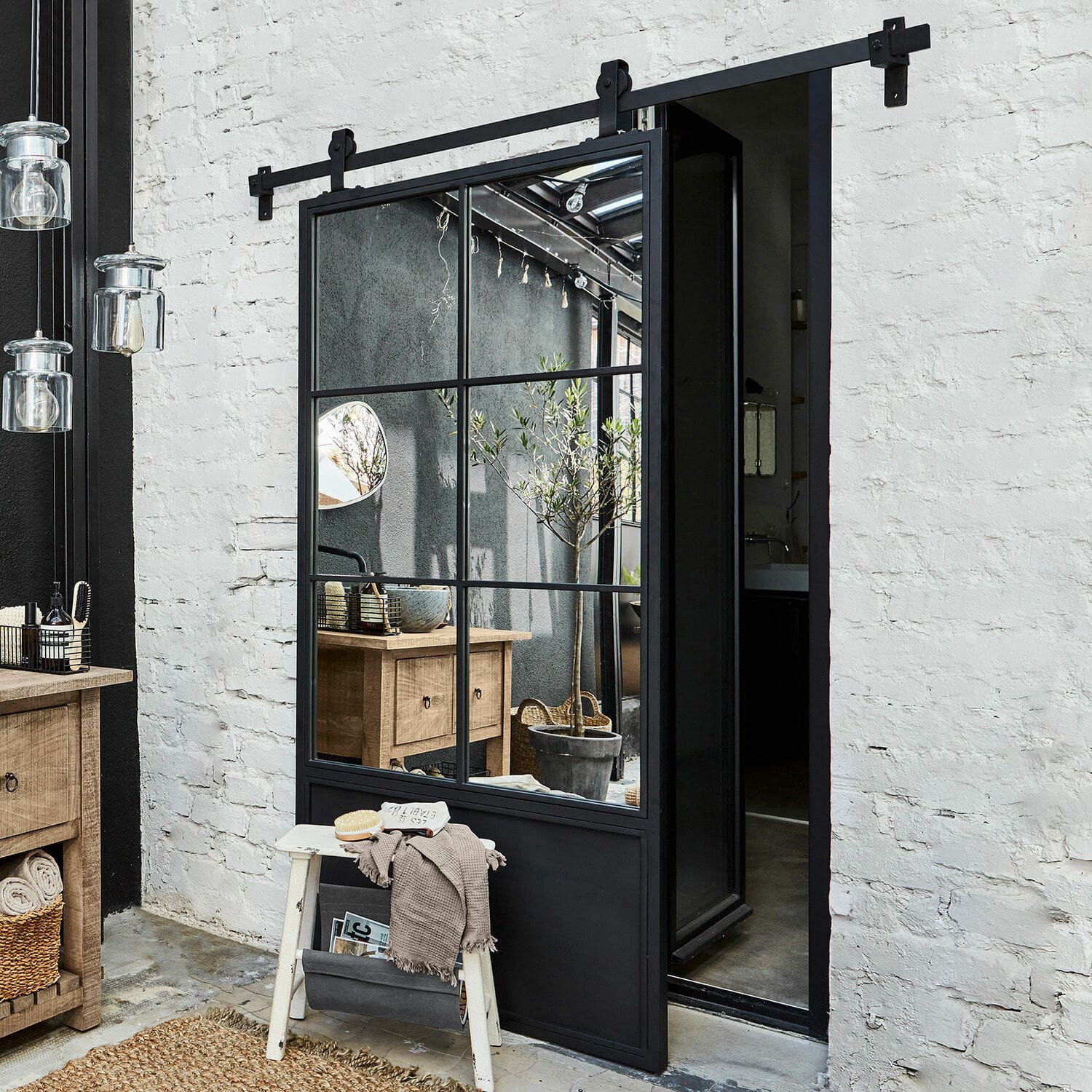 Porte coulissante Bonnaire Porte coulissante noire en métal avec miroir style industriel pour intérieur moderne