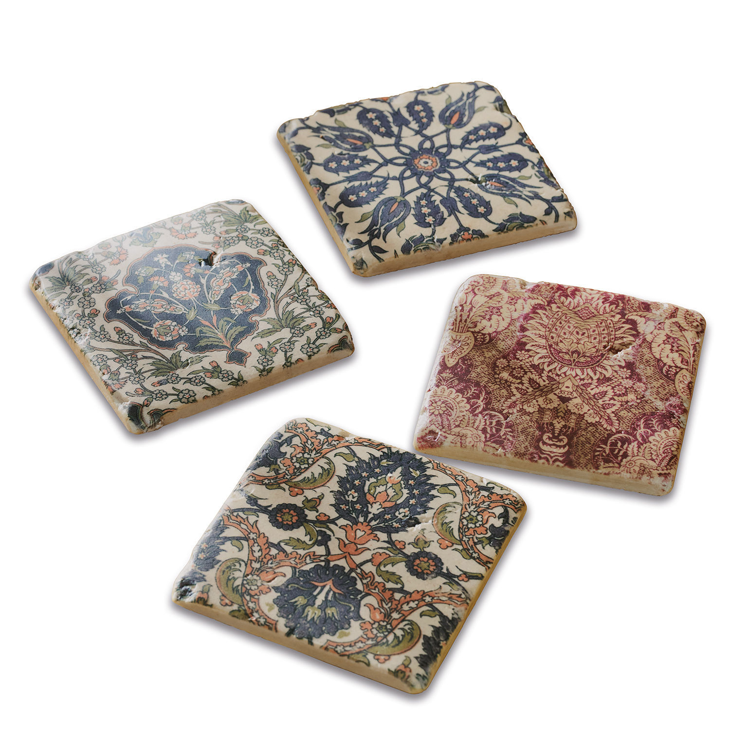 Lot de 4 dessous de verres Munoz Ensemble de quatre dessous de verre en céramique avec motifs floraux colorés pour protéger les surfaces