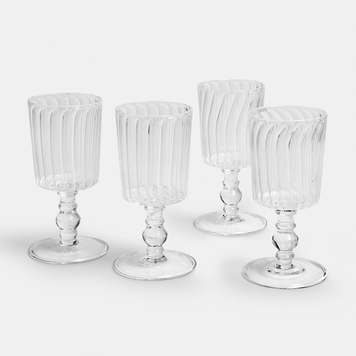Lot de 4 verres Lianzo Ensemble de quatre verres transparents en verre strié sur pied pour boissons